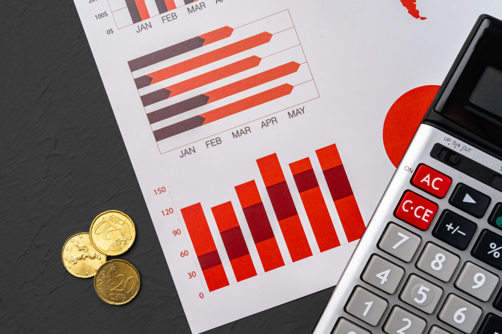 financial paper with charts and diagrams on gray t       utc x